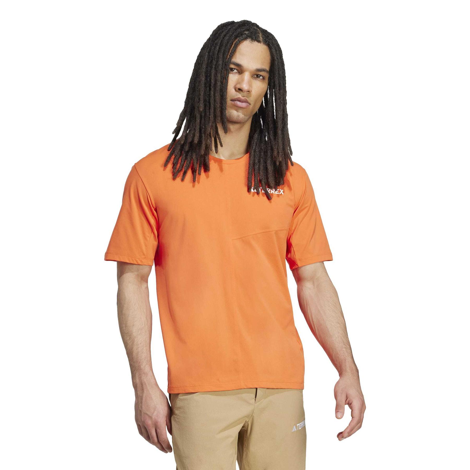 product/a/d/adidas_jm7087_4_apparel_on_model_walking_view_white.jpg
